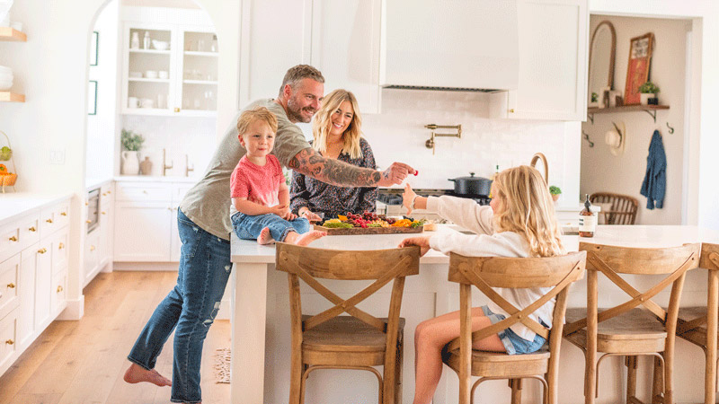 Sierra James Construction employee Gillian and family in kitchen 